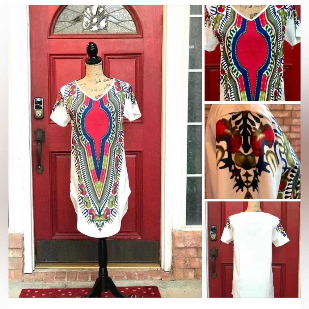 Beautiful Colorful Dress with art on frontside.  Solid white on back.